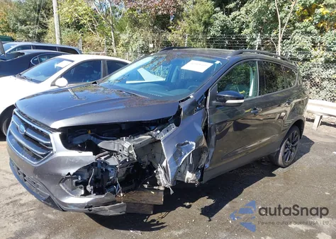 2017 Ford Escape Titanium from USA, damaged, VIN 1FMCU0J91HUD34701